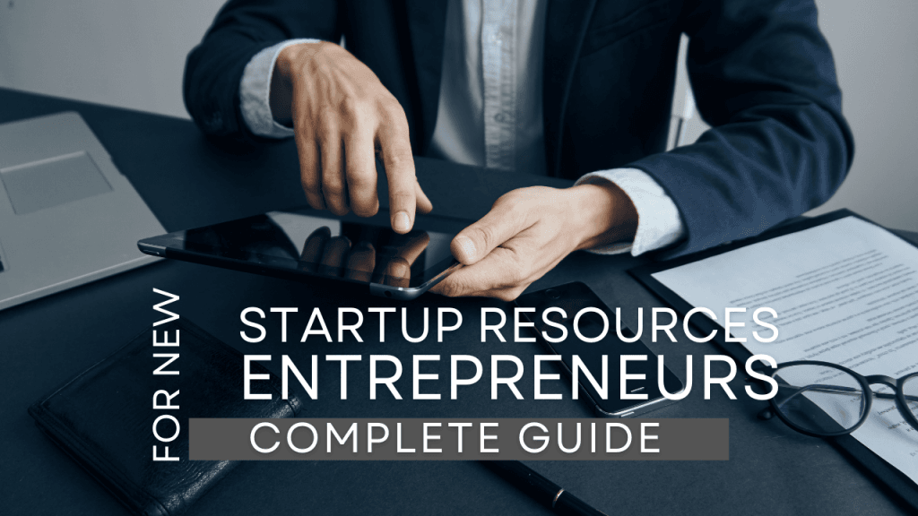 Businessman using tablet at modern desk with documents and laptop – Startup resources and planning concept